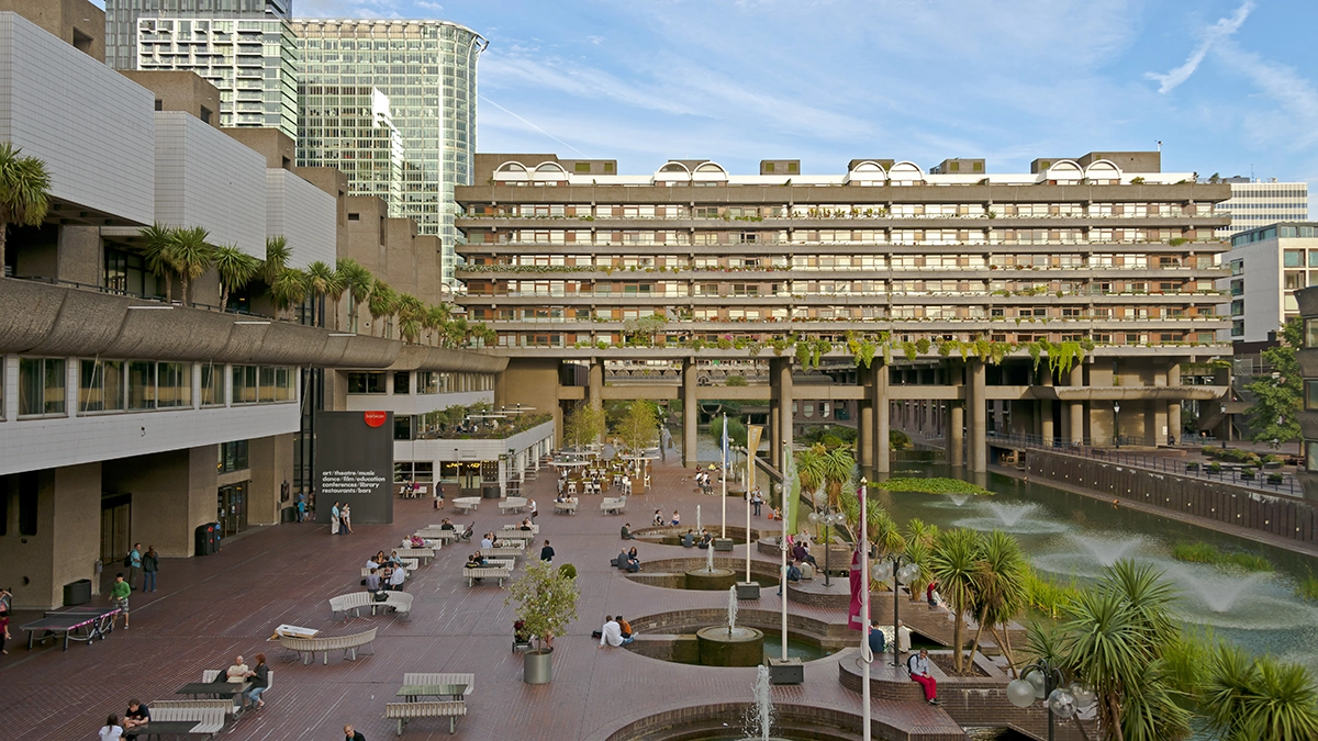 A view of the Barbican complex with seating and a water feature