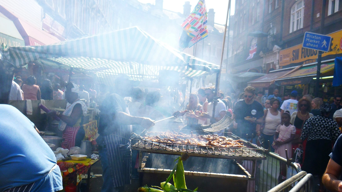 A busy street food vendor at Brixton Market