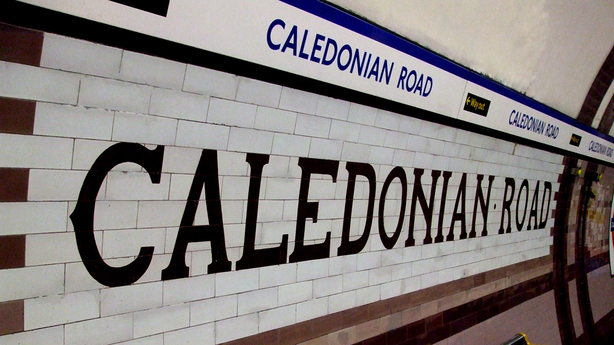 Caledonian Road tile name plate at platform level