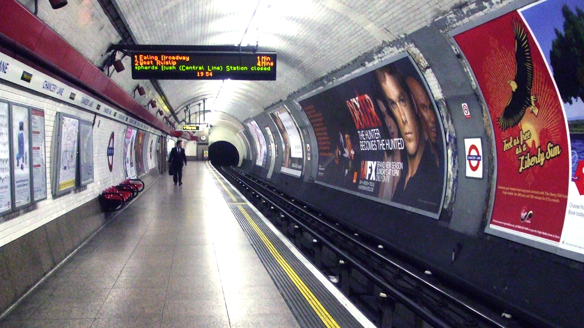 Cross track adverts on the Central line platform at Chancery Lane station