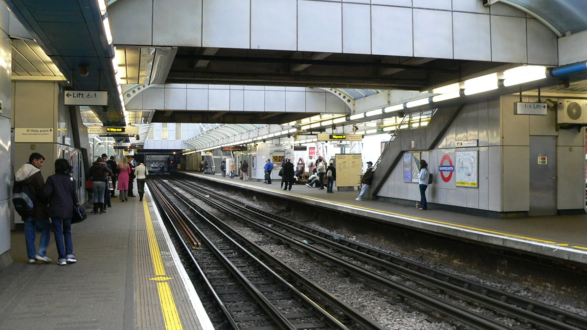 Commuters waiting for trains at Hammersmith station