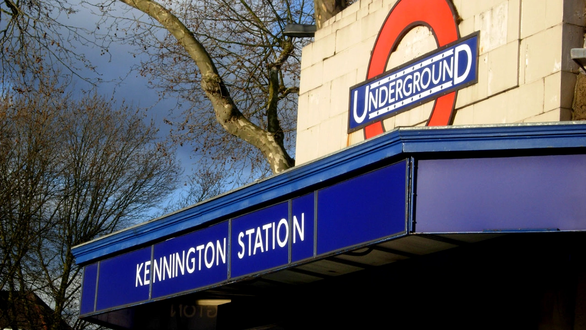 A closeup of the name plate outside Kennington station