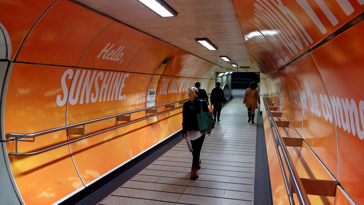 A takeover advert in a corridor at London Bridge underground station