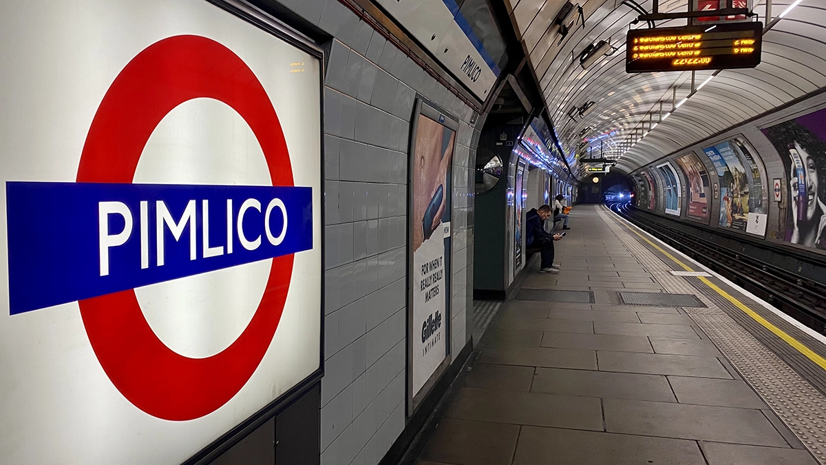 A roundel on a platform at Pimlico tube station