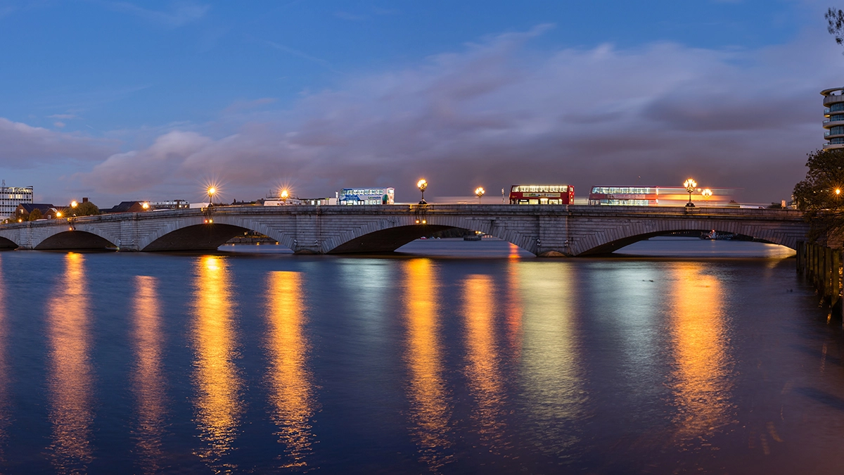 Looking across the Thames to Putney Bridge at dusk