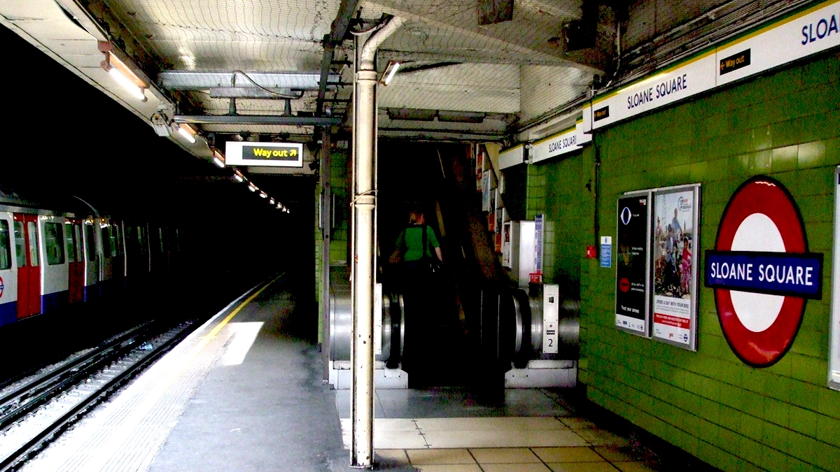Platform level poster adverts at Sloane Square station