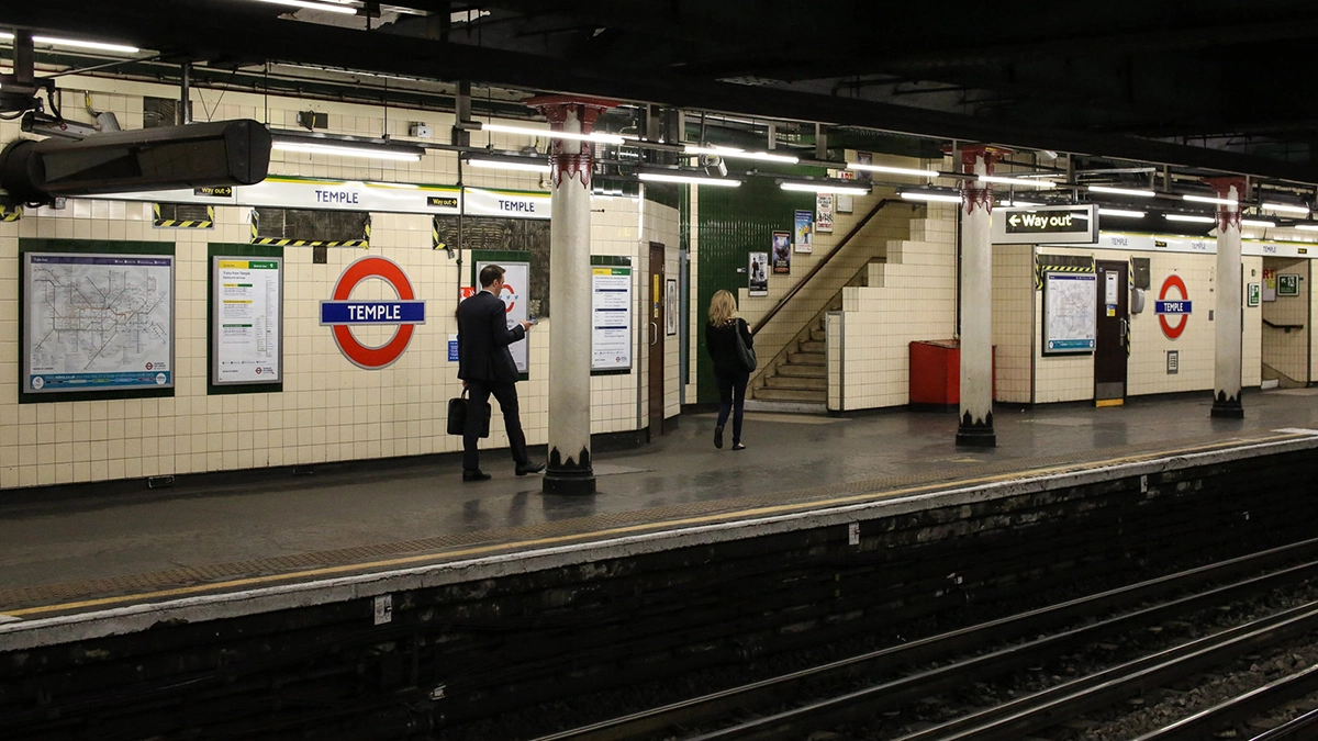 Commuters exiting the platform at Temple underground station