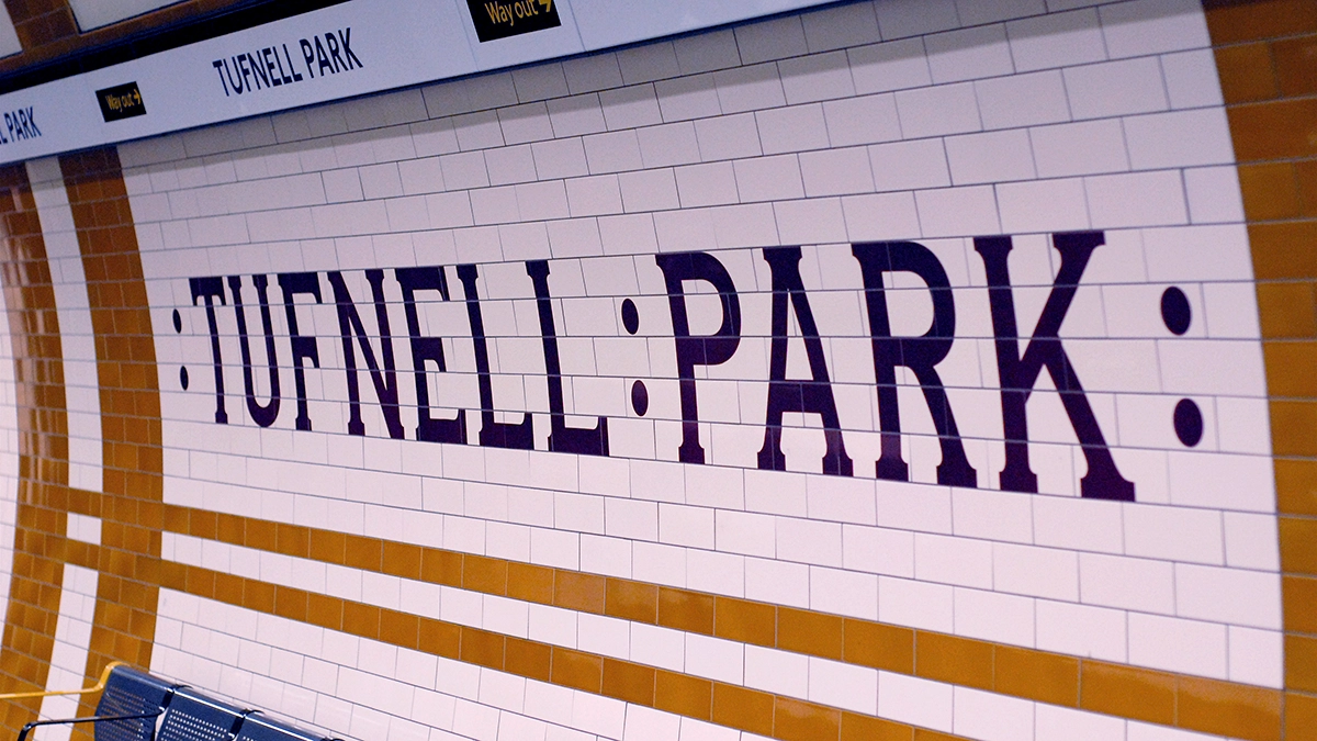 The platform at Tufnell Park with the station name on the tile walls